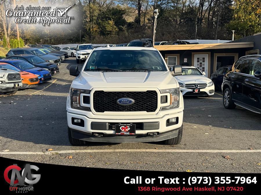 used 2018 Ford F-150 car, priced at $24,238