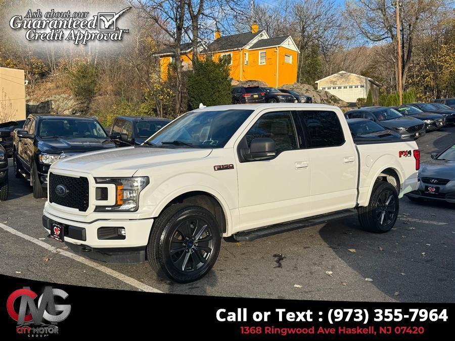 used 2018 Ford F-150 car, priced at $24,238