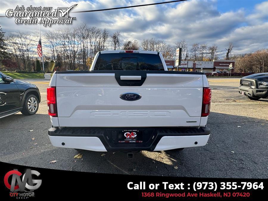 used 2018 Ford F-150 car, priced at $24,238