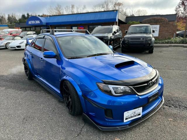 used 2011 Subaru Impreza WRX STi car, priced at $15,380