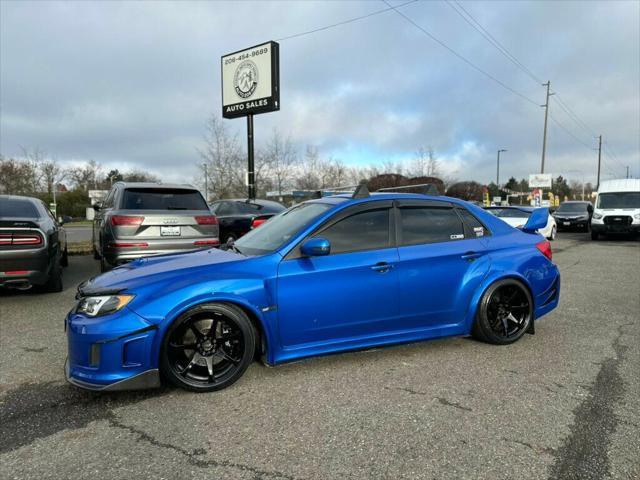 used 2011 Subaru Impreza WRX STi car, priced at $15,380