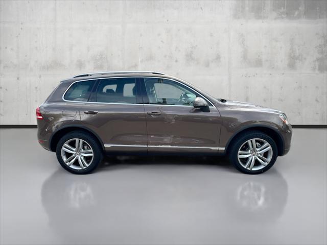 used 2011 Volkswagen Touareg car, priced at $13,880