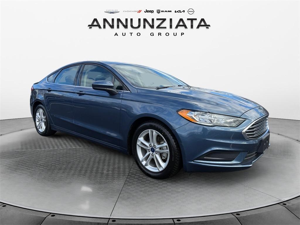 used 2018 Ford Fusion car, priced at $15,499