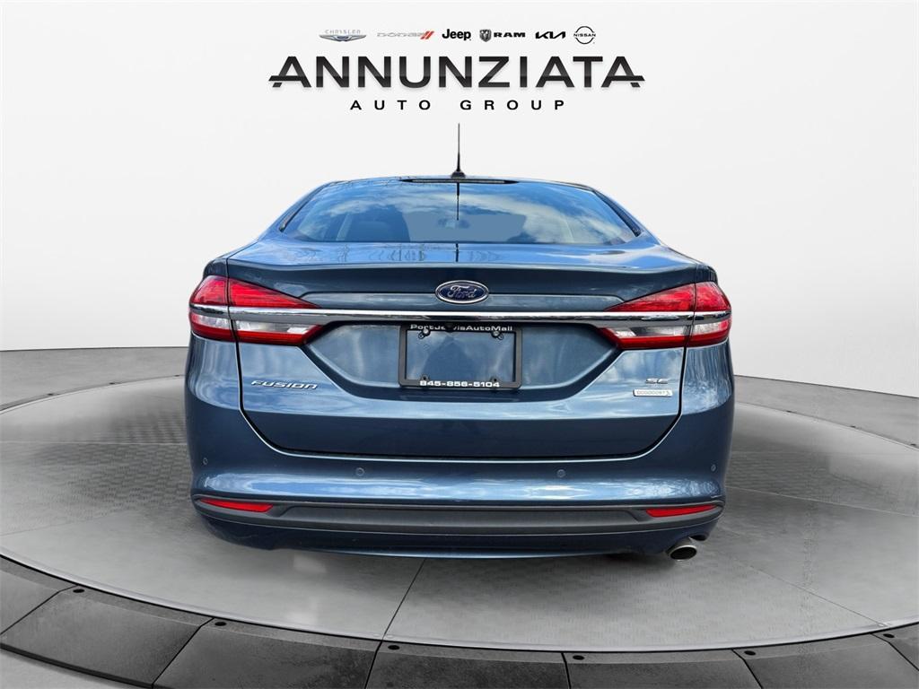 used 2018 Ford Fusion car, priced at $15,499