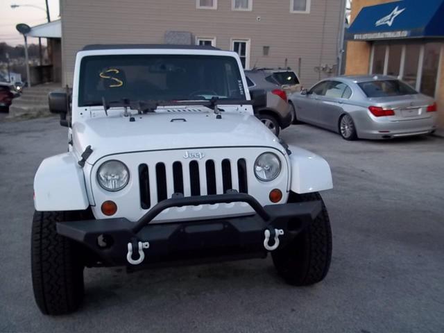 used 2013 Jeep Wrangler Unlimited car, priced at $16,575