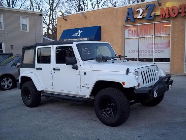 used 2013 Jeep Wrangler Unlimited car, priced at $15,741