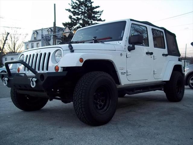 used 2013 Jeep Wrangler Unlimited car, priced at $15,741