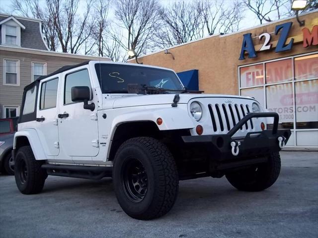 used 2013 Jeep Wrangler Unlimited car, priced at $16,475