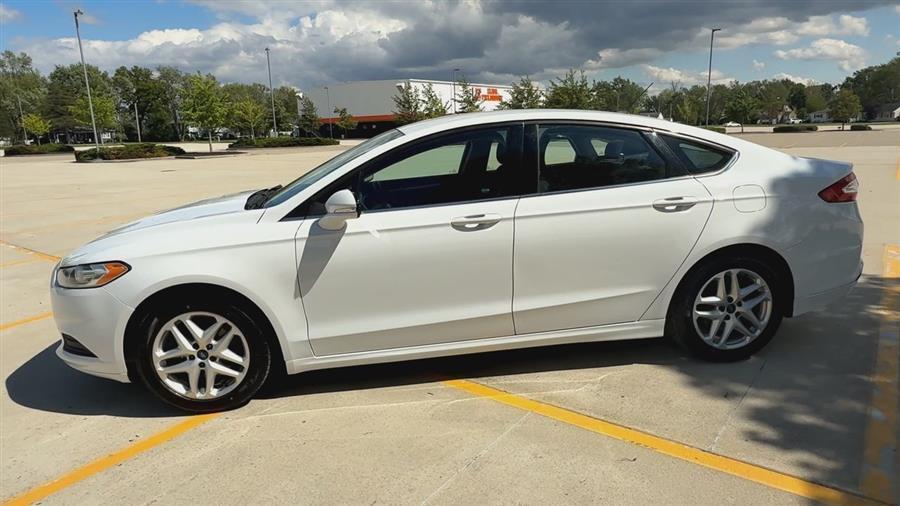 used 2016 Ford Fusion car, priced at $9,999