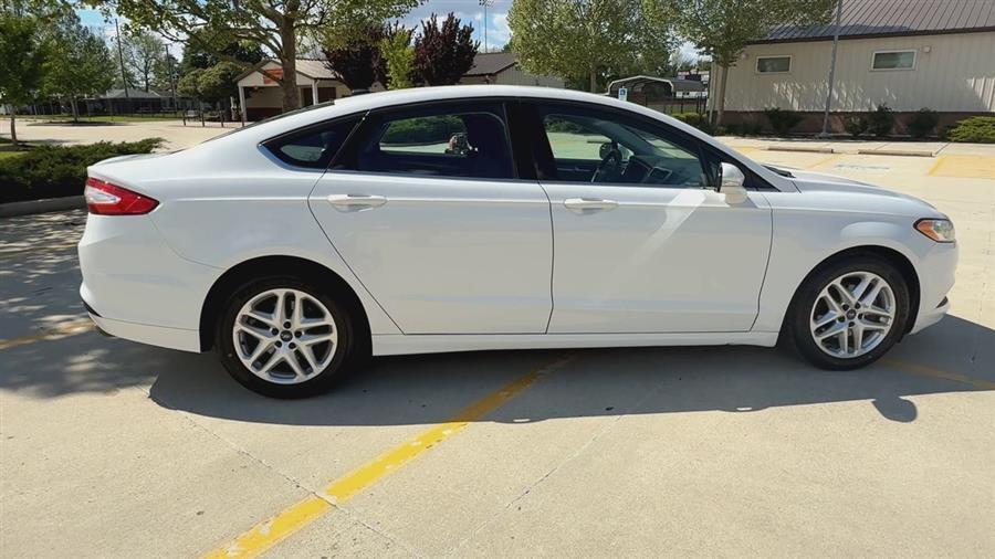 used 2016 Ford Fusion car, priced at $9,999