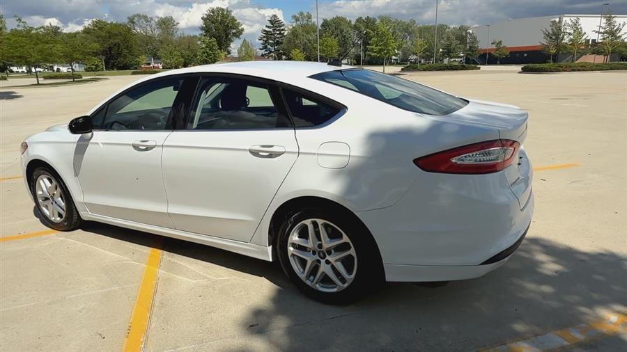 used 2016 Ford Fusion car, priced at $9,999