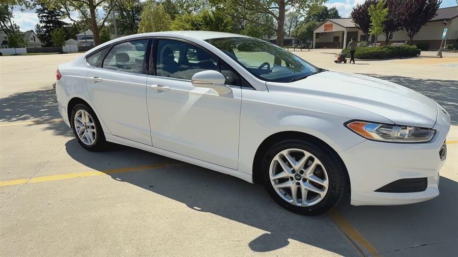used 2016 Ford Fusion car, priced at $9,999