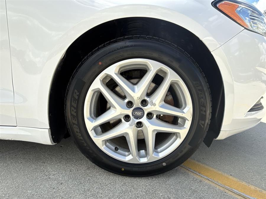 used 2016 Ford Fusion car, priced at $9,999