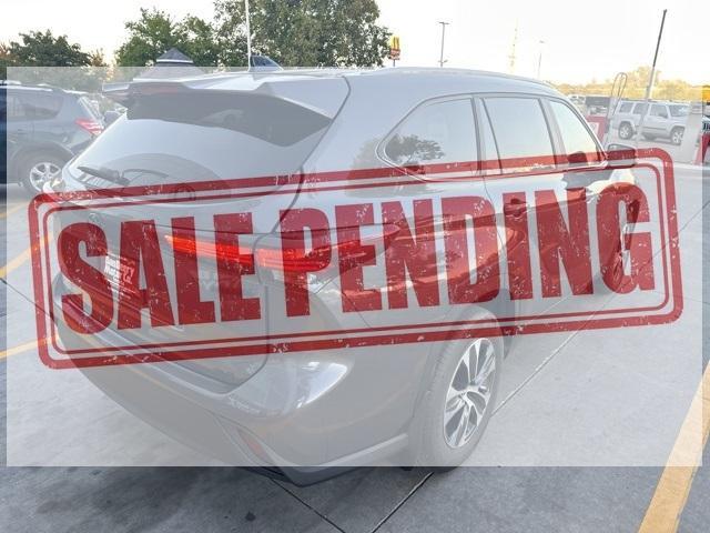 used 2024 Toyota Highlander Hybrid car, priced at $50,300