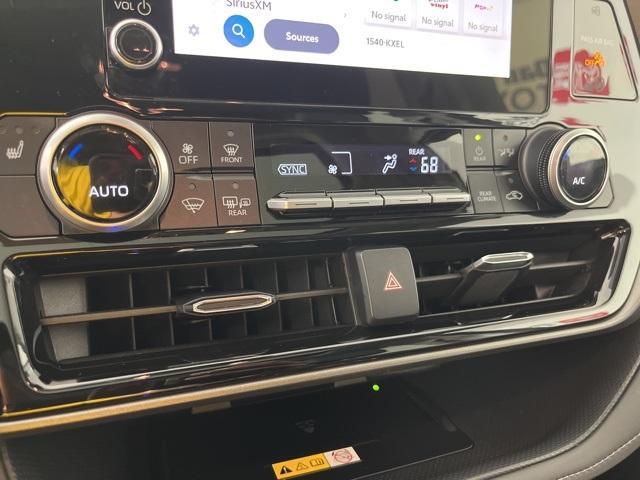 used 2024 Toyota Highlander Hybrid car, priced at $50,385