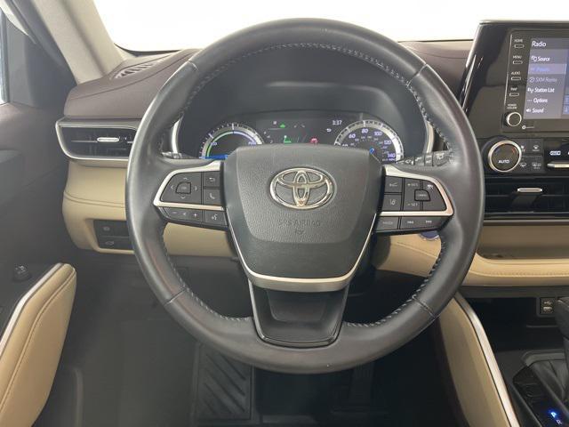 used 2022 Toyota Highlander Hybrid car, priced at $31,464