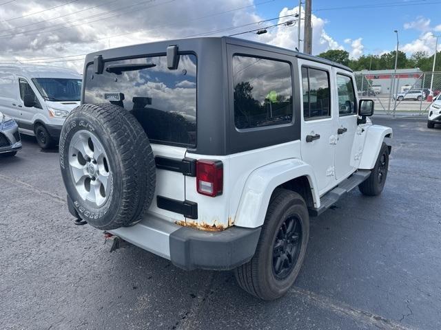used 2013 Jeep Wrangler Unlimited car, priced at $14,827