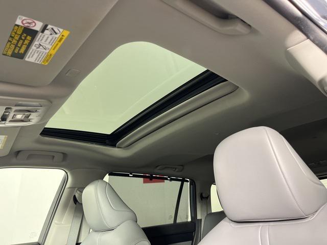 used 2022 Toyota Highlander Hybrid car, priced at $28,179