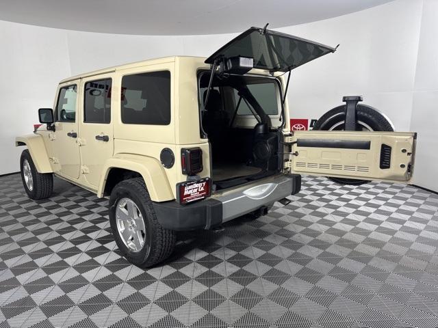 used 2011 Jeep Wrangler Unlimited car, priced at $11,203