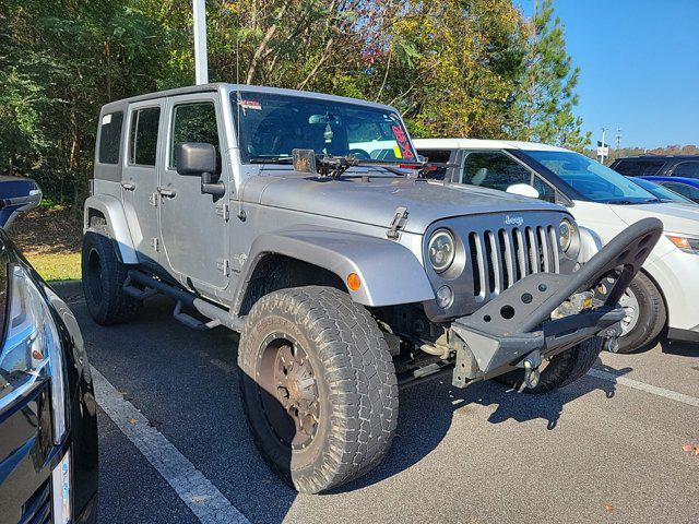 used 2014 Jeep Wrangler Unlimited car, priced at $17,416