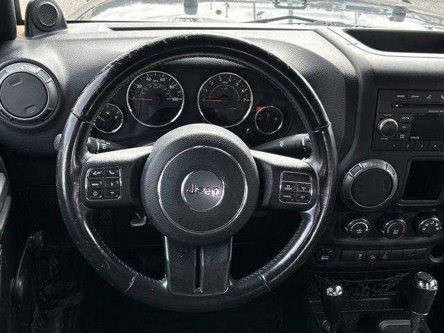 used 2014 Jeep Wrangler Unlimited car, priced at $15,572
