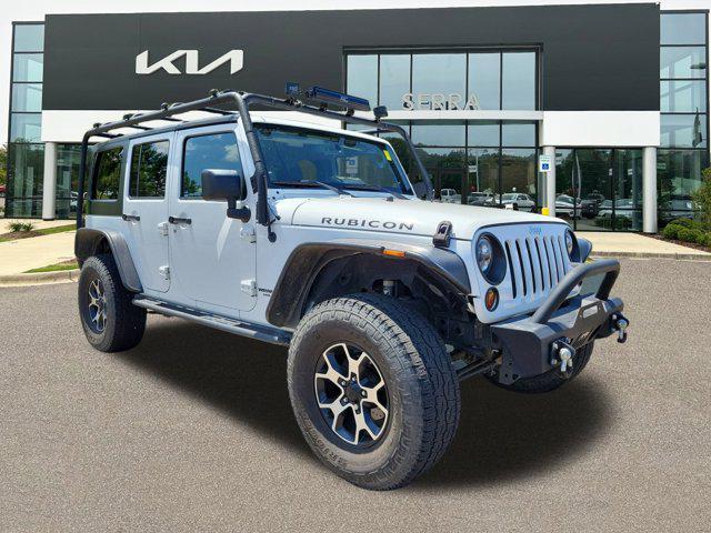 used 2013 Jeep Wrangler Unlimited car, priced at $13,818