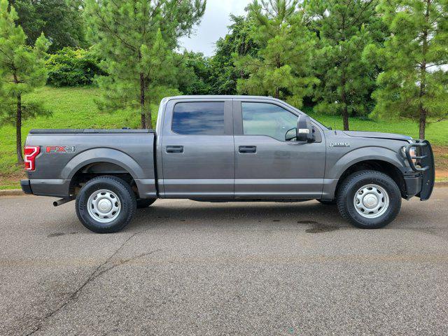 used 2018 Ford F-150 car, priced at $25,197