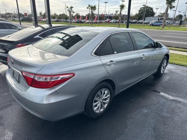 used 2016 Toyota Camry car, priced at $12,000