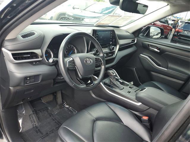 used 2021 Toyota Highlander Hybrid car, priced at $34,142