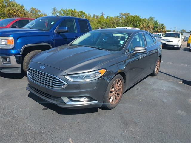 used 2017 Ford Fusion car, priced at $10,000