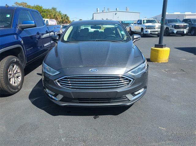 used 2017 Ford Fusion car, priced at $10,000