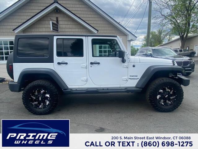 used 2014 Jeep Wrangler Unlimited car, priced at $13,399