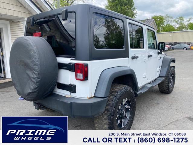 used 2014 Jeep Wrangler Unlimited car, priced at $13,399