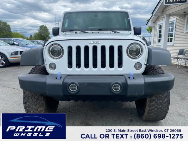 used 2014 Jeep Wrangler Unlimited car, priced at $13,399