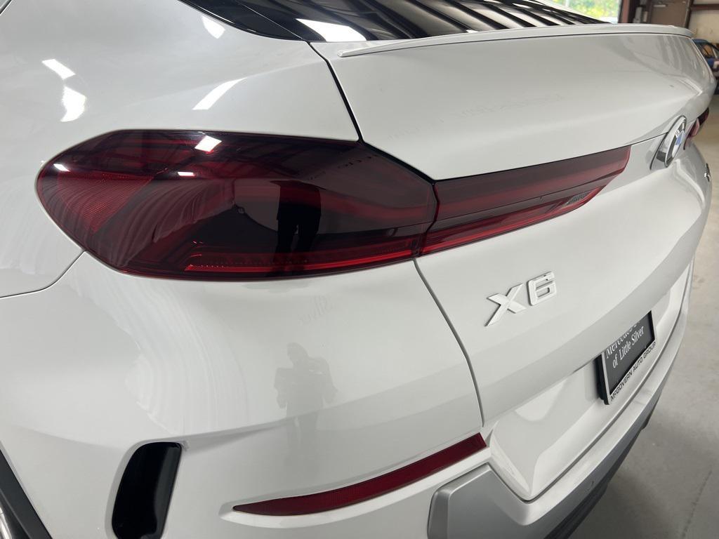 used 2023 BMW X6 car, priced at $56,350