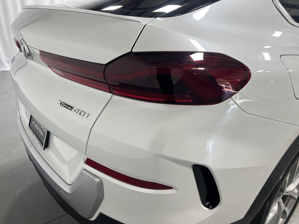 used 2023 BMW X6 car, priced at $56,350