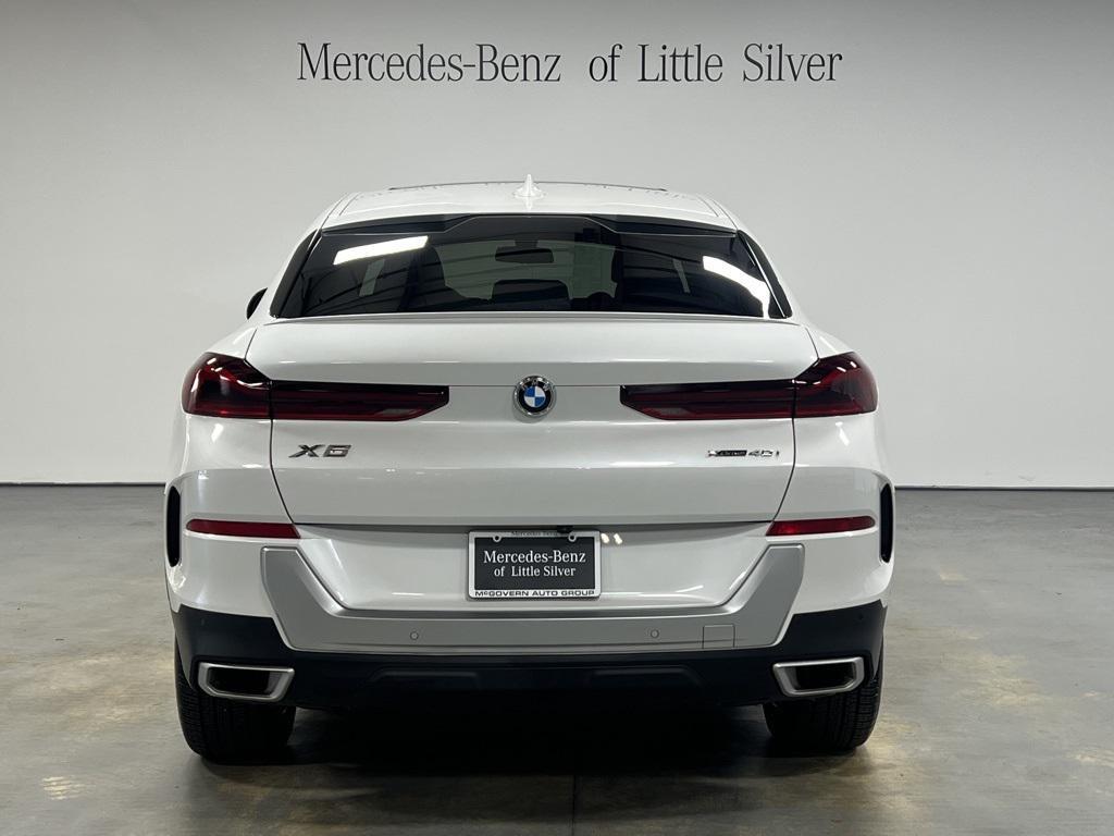 used 2023 BMW X6 car, priced at $56,350