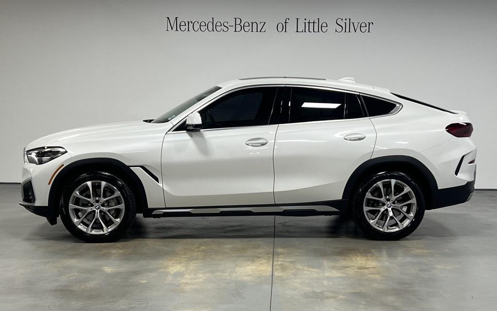 used 2023 BMW X6 car, priced at $56,350