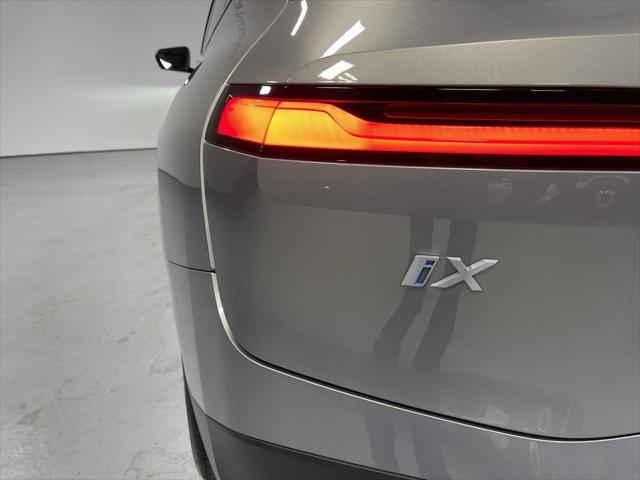 used 2024 BMW iX car, priced at $65,847