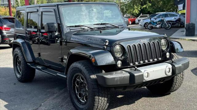 used 2015 Jeep Wrangler Unlimited car, priced at $16,999