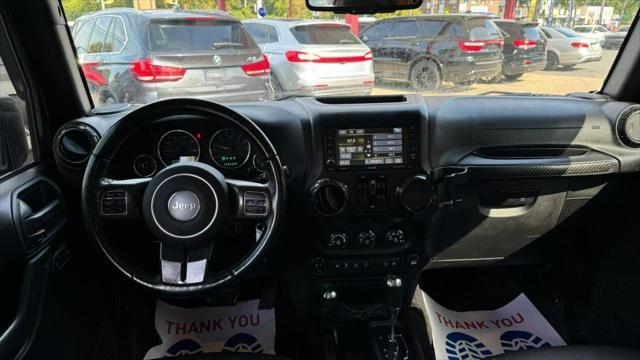 used 2015 Jeep Wrangler Unlimited car, priced at $16,999