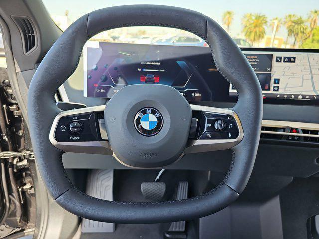 new 2026 BMW iX car, priced at $82,075