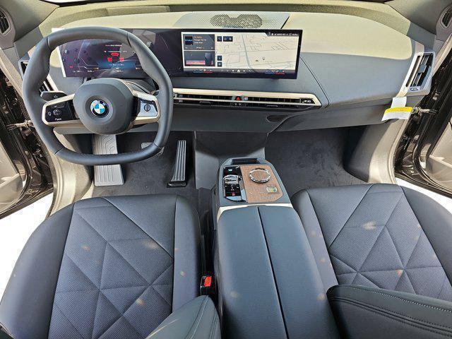 new 2026 BMW iX car, priced at $82,075