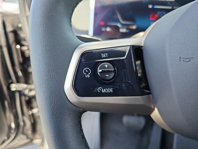 new 2026 BMW iX car, priced at $82,075