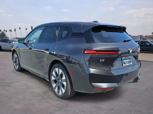 new 2026 BMW iX car, priced at $82,075
