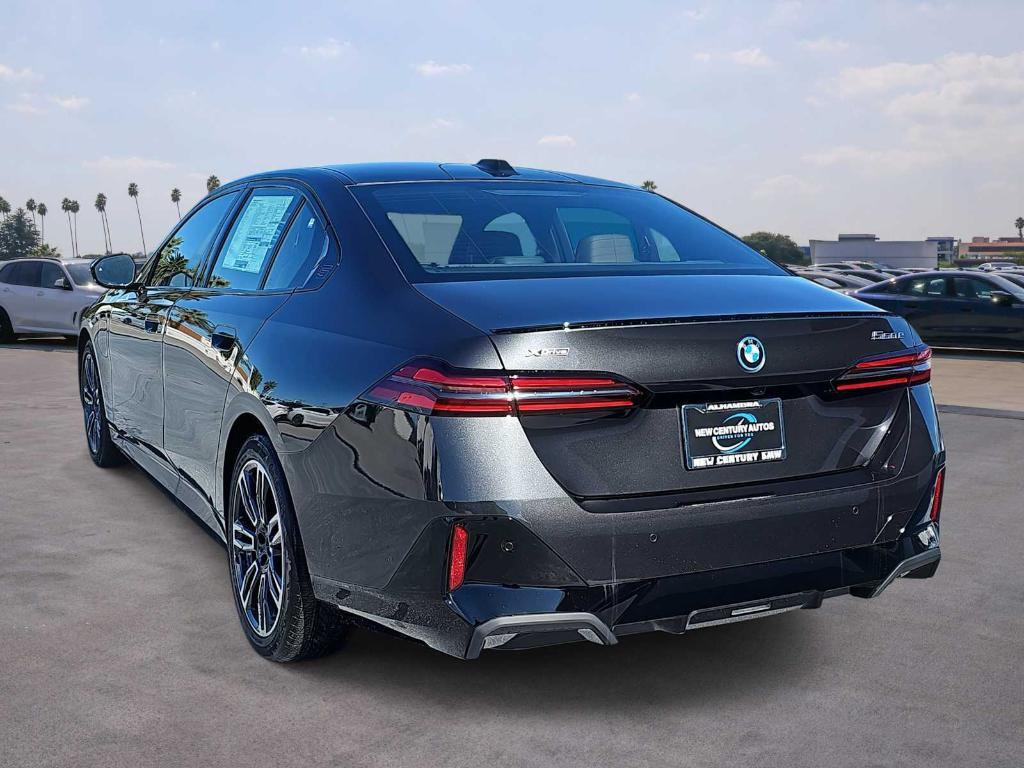 new 2026 BMW 550e car, priced at $84,690