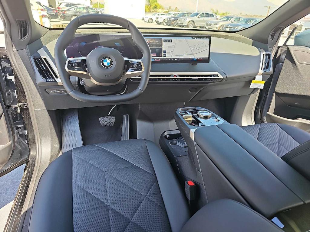new 2026 BMW iX car, priced at $94,570