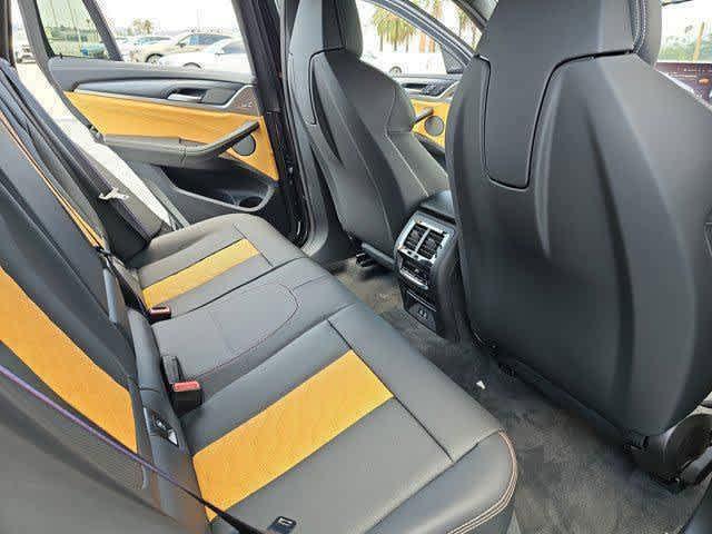 new 2025 BMW X4 M car, priced at $93,915