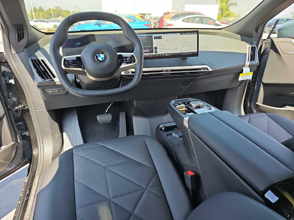 new 2026 BMW iX car, priced at $94,570