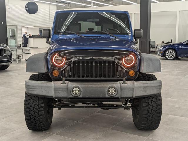 used 2010 Jeep Wrangler Unlimited car, priced at $11,900